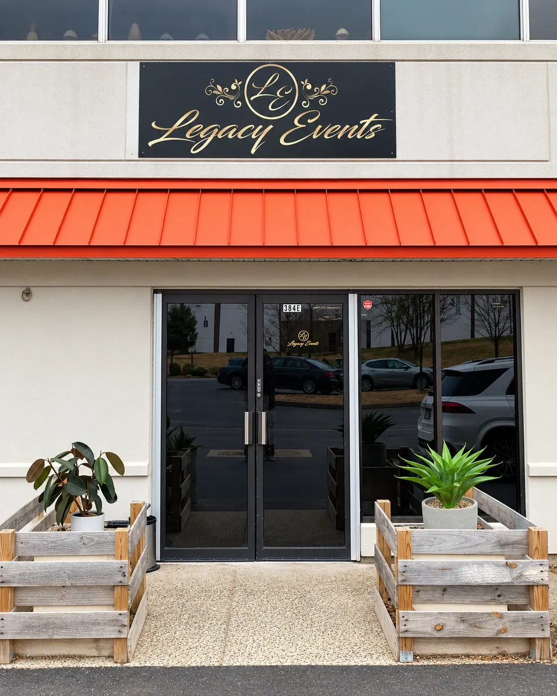 Legacy Events entrance at 384E, beneath the orange awning and Legacy Events sign
